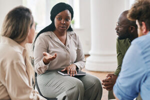 a group talks during benzo addiction rehab