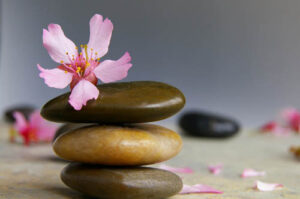 a stack of stones to represent a holistic therapy program