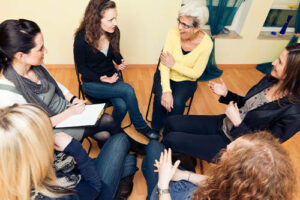 a group talks during meth addiction rehab