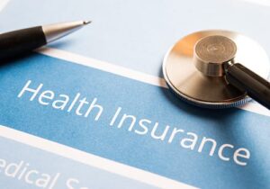 close up image of health insurance forms signifying Cigna insurance coverage