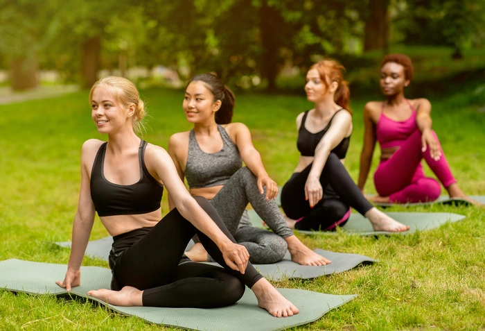 Holistic Therapy - women doing yoga